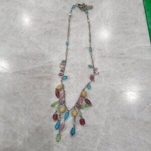 Glass bead necklace on a gold tone chain